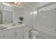 Bright bathroom featuring white vanity, tile floors, garden tub, and a shower at 5038 E Morning Star Dr, Phoenix, AZ 85044