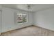 Bedroom with window, carpet, and bright natural light at 5038 E Morning Star Dr, Phoenix, AZ 85044