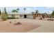 Well-maintained single-story home with a spacious driveway and desert-style landscaping at 5038 E Morning Star Dr, Phoenix, AZ 85044