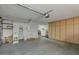Spacious garage featuring built-in storage cabinets along one wall and room for parking at 5038 E Morning Star Dr, Phoenix, AZ 85044