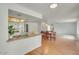 Spacious kitchen with stainless appliances, granite counters, wooden floors, and an eat-in breakfast area at 5038 E Morning Star Dr, Phoenix, AZ 85044