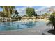 Sunny outdoor pool for swimming and relaxation with mature landscaping and seating areas at 5038 E Morning Star Dr, Phoenix, AZ 85044