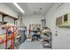 This storage room offers ample space and organization with shelves, work area and tool storage at 5038 E Morning Star Dr, Phoenix, AZ 85044