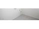 Clean laundry room area with a white tile floor and essential hookups for washer and dryer at 5818 W Sunrise Dr, Laveen, AZ 85339