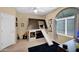 Charming bedroom with a custom-built playhouse bed and slide, creating a fun and imaginative space at 7242 E Tyndall St, Mesa, AZ 85207