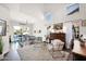 Bright and airy living room with high ceilings, large windows, and stylish decor at 7242 E Tyndall St, Mesa, AZ 85207