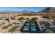 Aerial view of community pickleball courts with mountain views and lush landscaping at 7242 E Tyndall St, Mesa, AZ 85207