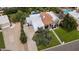 Aerial view of property featuring a pool, well-manicured yard, and distinctive roof at 7250 E Paradise Dr, Scottsdale, AZ 85260