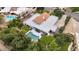 Aerial view of the home showing the pool, patio and landscaping at 7250 E Paradise Dr, Scottsdale, AZ 85260