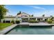 Stunning backyard view with pool and lush landscaping, perfect for outdoor entertaining at 7250 E Paradise Dr, Scottsdale, AZ 85260