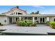 Backyard features a covered patio and manicured landscaping at 7250 E Paradise Dr, Scottsdale, AZ 85260