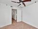 Empty bedroom with ceiling fan and views of other rooms, ready to be customized for your comfort at 7250 E Paradise Dr, Scottsdale, AZ 85260