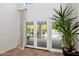 Interior view of double doors leading to the backyard and pool area at 7250 E Paradise Dr, Scottsdale, AZ 85260