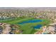 Picturesque aerial of lush golf course with beautiful lakes and community at 7445 E Eagle Crest Dr # 1122, Mesa, AZ 85207