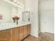 Well-lit bathroom featuring a double vanity, neutral color palette, and modern fixtures at 7445 E Eagle Crest Dr # 1122, Mesa, AZ 85207
