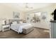 Comfortable bedroom with ceiling fan, natural light, neutral tones, and coordinated decor at 7445 E Eagle Crest Dr # 1122, Mesa, AZ 85207