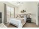 Charming bedroom features a plush bed, two side tables, and a cozy, inviting atmosphere at 7445 E Eagle Crest Dr # 1122, Mesa, AZ 85207