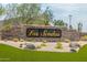 Las Sendas community entrance sign surrounded by desert plants and stone landscaping at 7445 E Eagle Crest Dr # 1122, Mesa, AZ 85207
