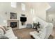 Spacious living room with high ceilings, fireplace, and comfortable seating at 7445 E Eagle Crest Dr # 1122, Mesa, AZ 85207