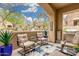 Inviting outdoor patio with comfortable seating, and a beautiful view of the community at 7445 E Eagle Crest Dr # 1122, Mesa, AZ 85207