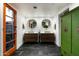 Stylish bathroom with double sinks, modern fixtures, and bright lighting at 8644 E Sweetwater Ave, Scottsdale, AZ 85260
