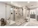 This bathroom features a zero-entry shower, dual showerheads, and built-in shelving at 87 Biltmore Est, Phoenix, AZ 85016