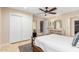 This bedroom features white closets, neutral decor, an accent rug and an open doorway at 87 Biltmore Est, Phoenix, AZ 85016