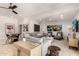 Cozy living room featuring stylish decor, art pieces, and comfortable seating arrangements at 87 Biltmore Est, Phoenix, AZ 85016