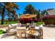 Relaxing outdoor patio with comfortable seating and lush landscaping, ideal for entertaining at 87 Biltmore Est, Phoenix, AZ 85016