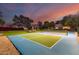 The private tennis court is surrounded by manicured landscaping, adding to the allure of this Scottsdale property at 87 Biltmore Est, Phoenix, AZ 85016