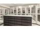 This walk-in closet features custom cabinet lighting, mirrored doors, and ample storage at 87 Biltmore Est, Phoenix, AZ 85016