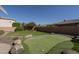 Beautiful backyard with putting green and lush landscaping at 8925 E Ann Way, Scottsdale, AZ 85260