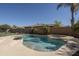 Inviting pool and spa surrounded by lush tropical landscaping at 8925 E Ann Way, Scottsdale, AZ 85260