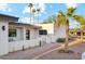 Charming exterior with desert landscaping and a modern aesthetic provides excellent curb appeal at 9052 N 29Th St, Phoenix, AZ 85028