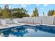 Sparkling pool features a cascading water feature, desert landscaping, and plenty of room for lounging at 9052 N 29Th St, Phoenix, AZ 85028