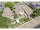 Aerial showcasing the backyard with artificial turf, patio, and neighboring houses at 927 W Azalea Pl, Chandler, AZ 85248
