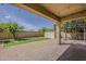 Inviting backyard with lush turf, brick pavers, and covered patio for outdoor enjoyment at 927 W Azalea Pl, Chandler, AZ 85248