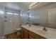 Bathroom featuring double sinks, shower, and tub combo with nice lighting at 927 W Azalea Pl, Chandler, AZ 85248