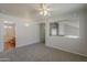 Open bonus room with neutral walls, plush carpeting, and an adjacent bathroom at 927 W Azalea Pl, Chandler, AZ 85248