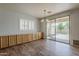 Well-lit dining room with ample cabinet space and patio access, perfect for entertaining at 927 W Azalea Pl, Chandler, AZ 85248
