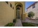 Inviting front entrance with a secure screen door and manicured landscaping at 927 W Azalea Pl, Chandler, AZ 85248