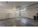 Spacious garage with ample storage, epoxy floors, and modern water heater at 927 W Azalea Pl, Chandler, AZ 85248