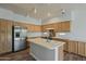 Spacious kitchen features an island and stainless steel appliances at 927 W Azalea Pl, Chandler, AZ 85248