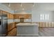 Well-equipped kitchen with center island, stainless steel appliances, and a bright, open design at 927 W Azalea Pl, Chandler, AZ 85248