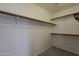 Spacious walk-in closet featuring multiple shelves and rods for ample storage at 927 W Azalea Pl, Chandler, AZ 85248