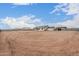Vast dirt lot showing potential for landscaping and outdoor living space at 9430 W Sandstone Mountain Dr, Casa Grande, AZ 85194