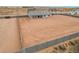 Property with a large yard and block wall fencing for privacy at 9430 W Sandstone Mountain Dr, Casa Grande, AZ 85194