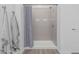 Bathroom features a walk-in shower with modern shower head, hardware, and tile at 9430 W Sandstone Mountain Dr, Casa Grande, AZ 85194