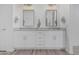 Bathroom features double vanity, mirrors, and modern fixtures for a luxurious feel at 9430 W Sandstone Mountain Dr, Casa Grande, AZ 85194