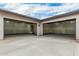 Three car garage with ample driveway space, perfect for multiple vehicles and outdoor activities at 9430 W Sandstone Mountain Dr, Casa Grande, AZ 85194